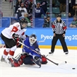 GANGNEUNG, SOUTH KOREA - FEBRUARY 22: Canada's Melodie Daoust #15 scores a shoot-out goal against USA's Maddie Rooney #35 during gold medal game action at the PyeongChang 2018 Olympic Winter Games. (Photo by Andre Ringuette/HHOF-IIHF Images)

